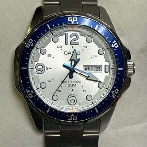 Casio Silver Watch with Blue Bezel